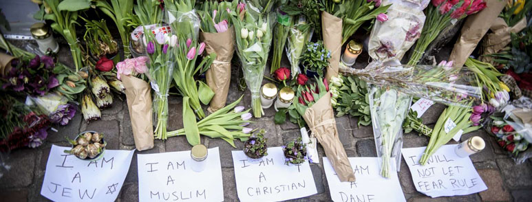 Picture of flowers with notes attached after a terror attack in Copenhagen, Denmark