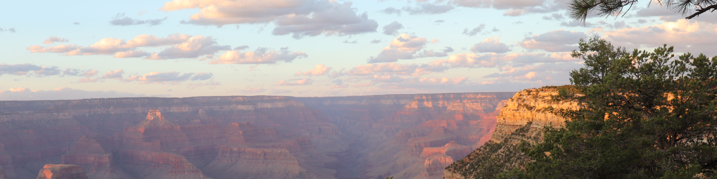 sun slowly setting at Grand Canyon